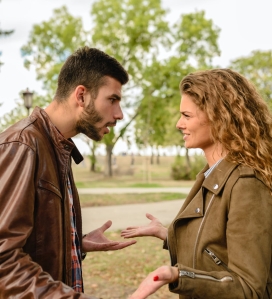 man and woman wearing brown leather jackets